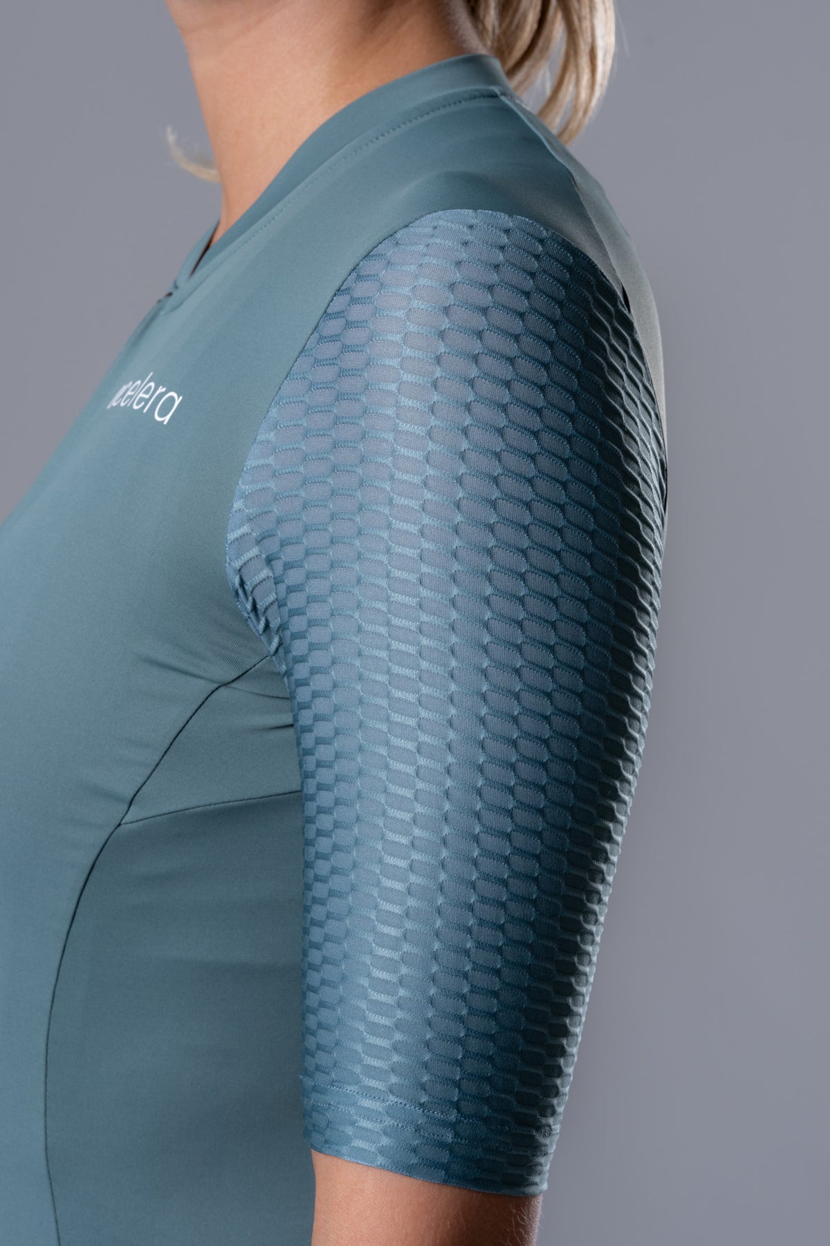 Acelera Women Pro cycling jersey Short Sleeve - Ocean Green Detail #Color_Ocean Green